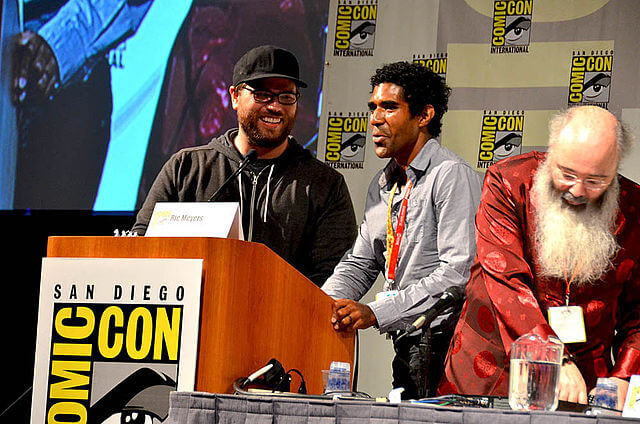 People on stage at San Diego Comic-Con International 2012 / Wikimedia Commons / Rene Carson
Link: https://commons.wikimedia.org/wiki/File:Jan-Lucanus-san-diego-comic-con-international-2012.jpg