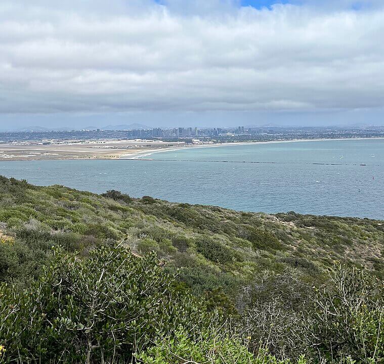 View of Cabrillo National Monument / Wikipedia / Natecation https://en.wikipedia.org/wiki/Cabrillo_National_Monument#/media/File:View_of_San_Diego_from_the_Bayside_Trail_in_Cabrillo_National_Monument.jpg
