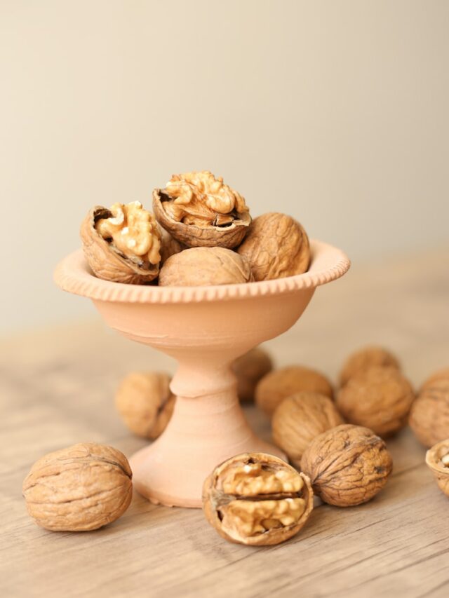 white ceramic bowl with brown and white mushrooms